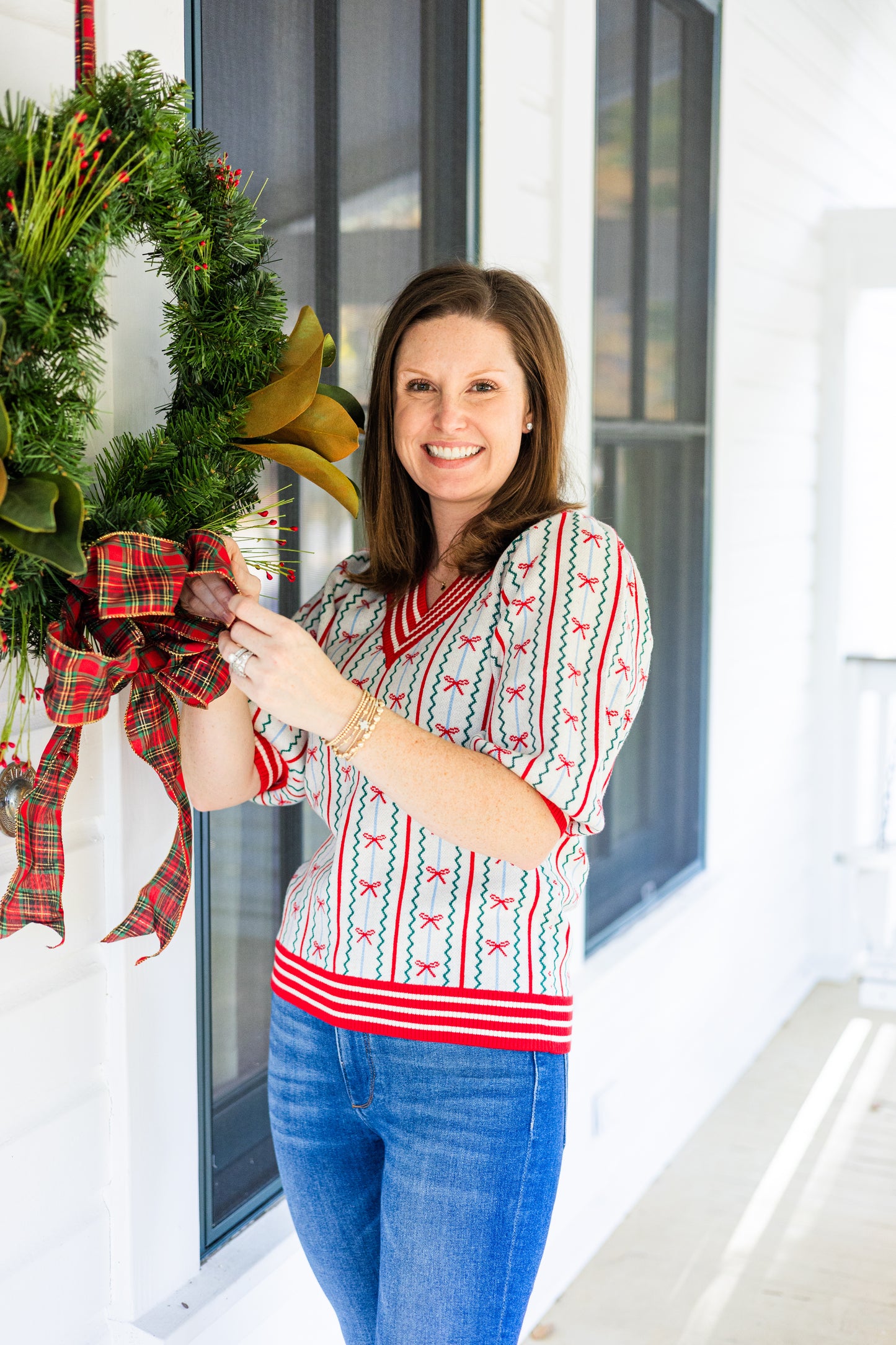 FAITH IN A BOW SWEATER