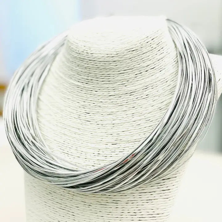 SILVER LEATHERETTE STRAND