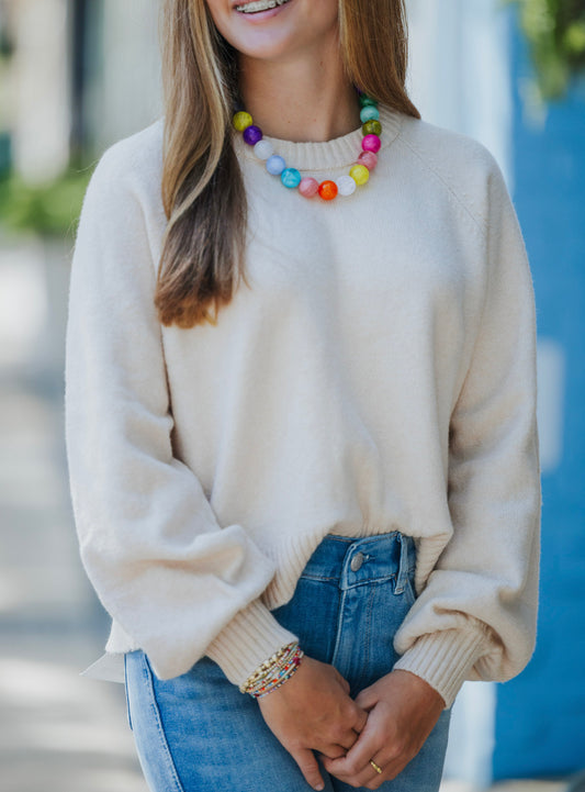 COMING UP SWEATER